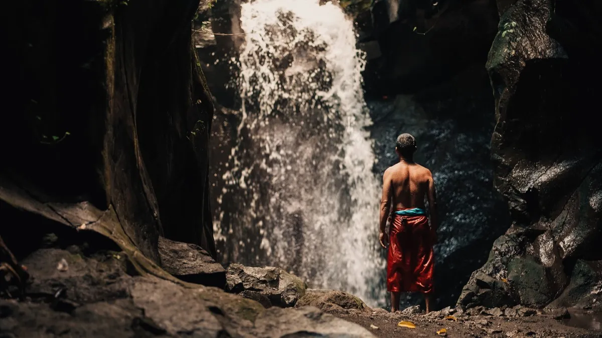 A Sacred Waterfall Purification at Pura Taman Pecampuhan