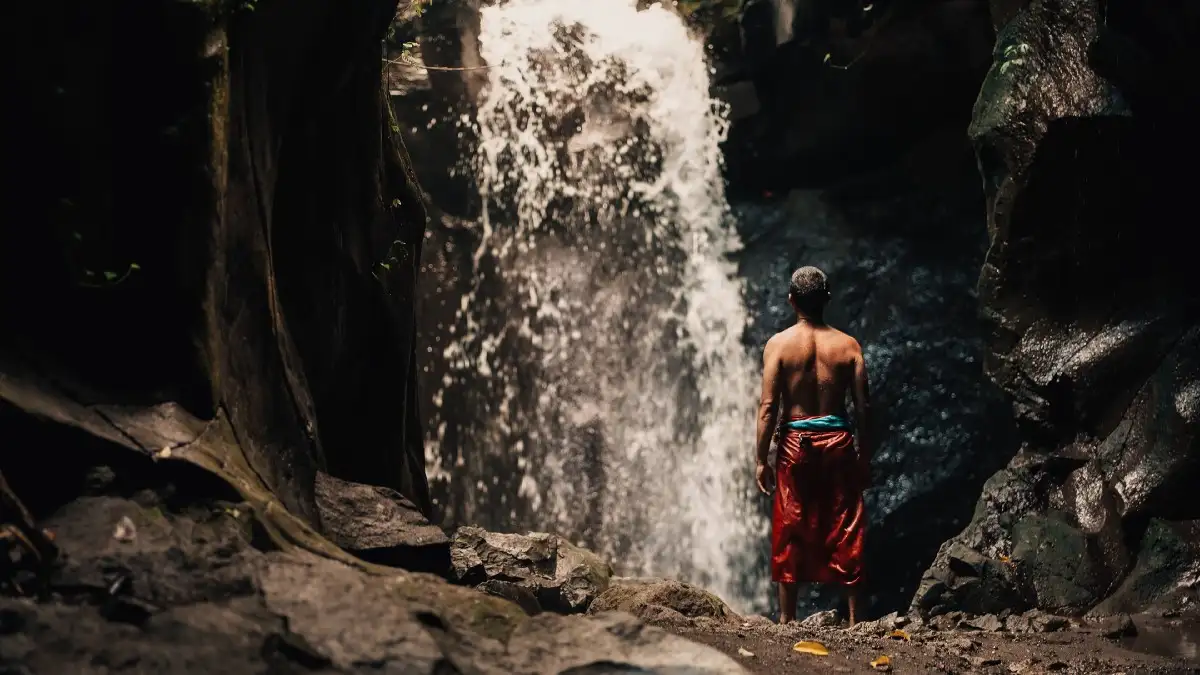 A Sacred Waterfall Purification at Pura Taman Pecampuhan
