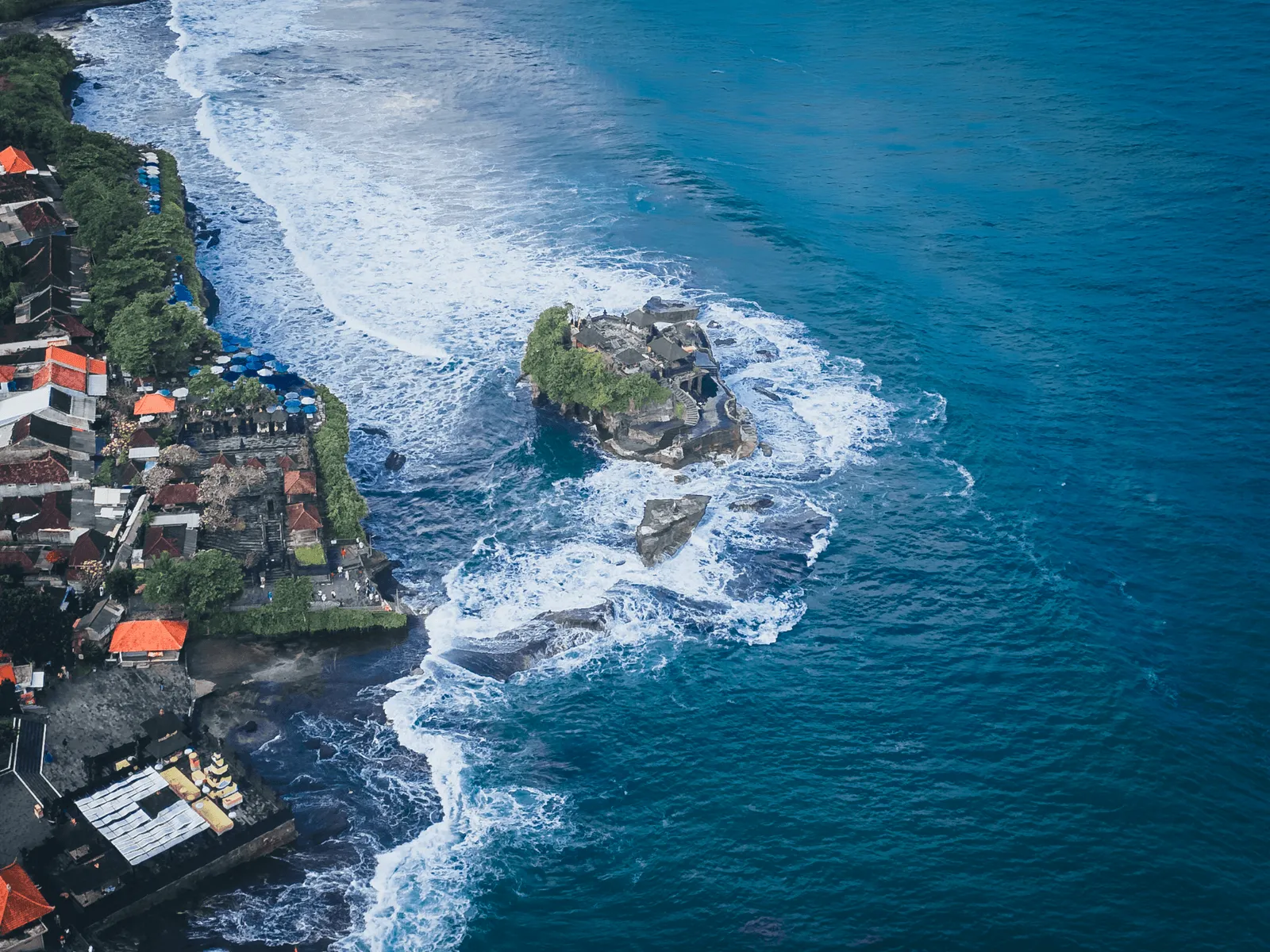 Sunset Blessings at Tanah Lot's Sacred Shore